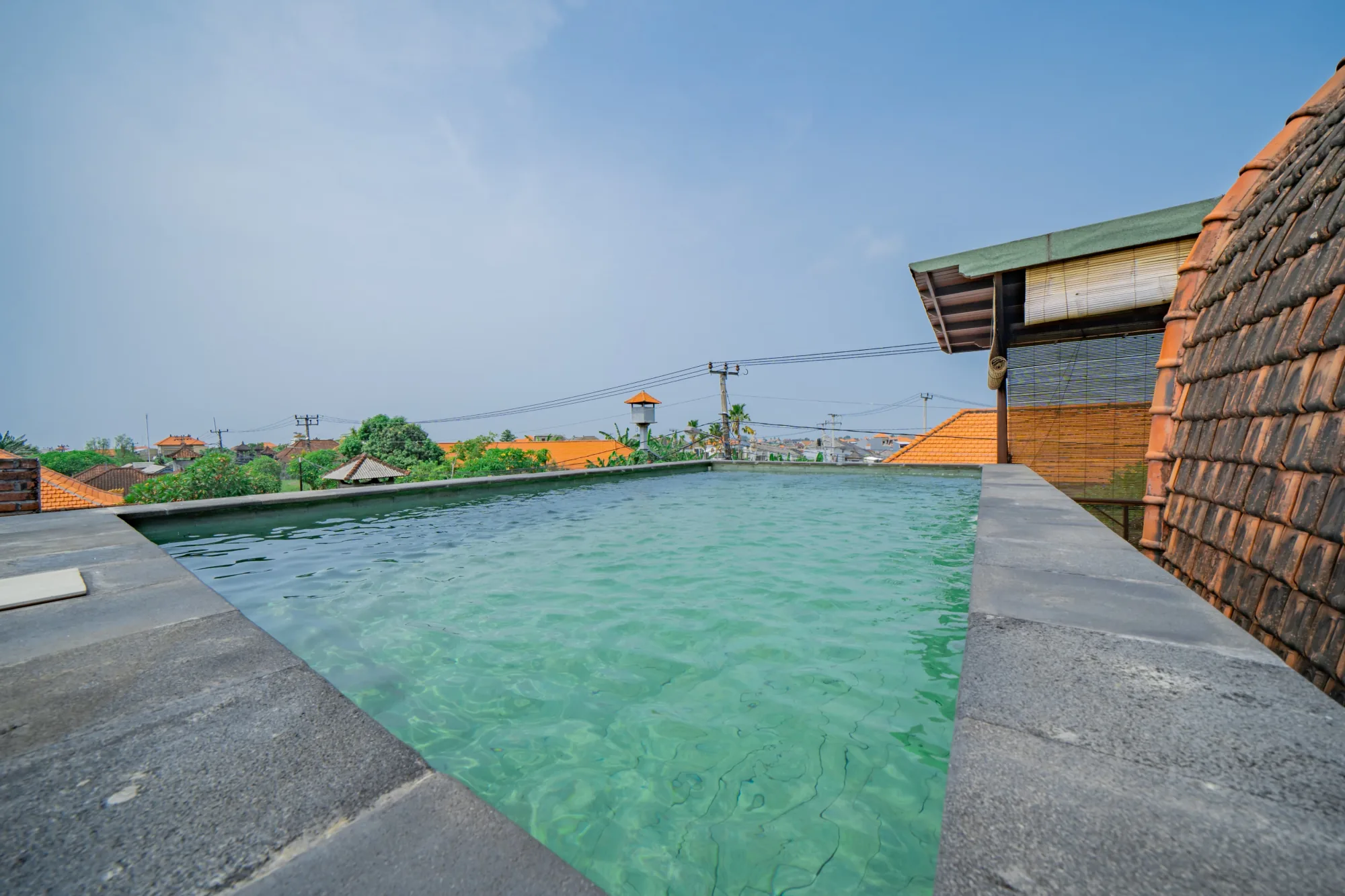 Rooftop pool at the SAS guest house in Dalung, July 2026