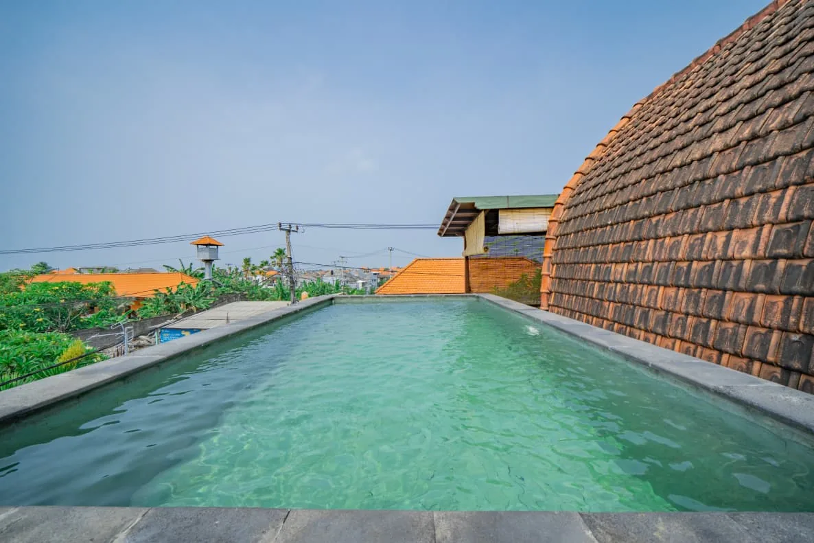 Rooftop pool terrace, July 2026