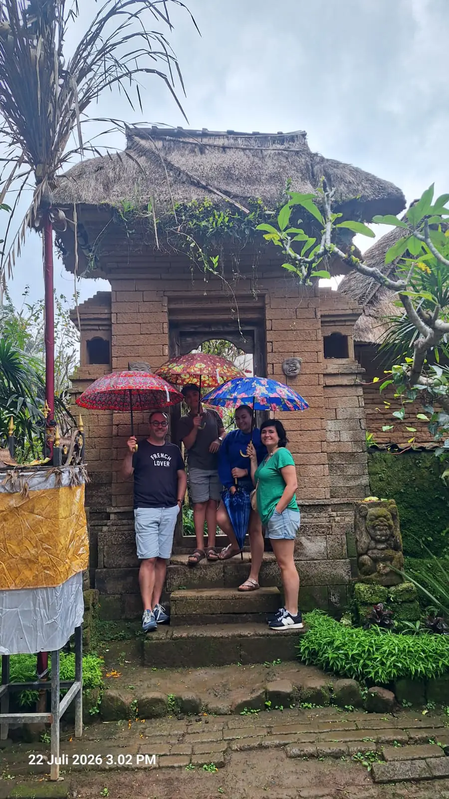 A village gateway on a rainy afternoon, July 2026