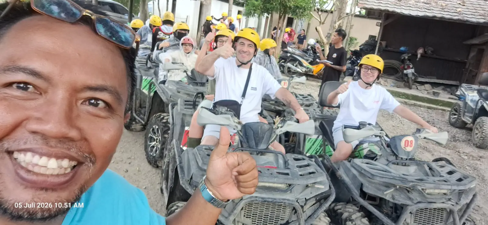 Our driver with a group of guests before an ATV ride, July 2026