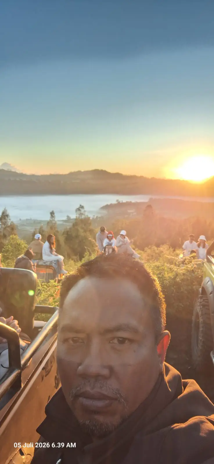 Lever du soleil sur le lac Batur depuis la jeep · juillet 2026