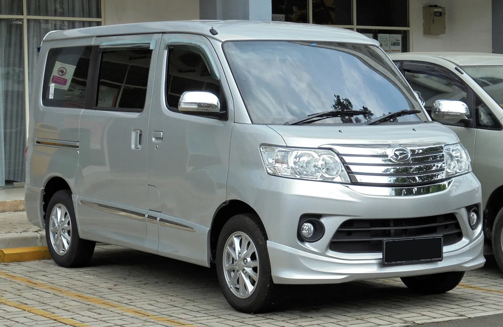 Silver Daihatsu Luxio, front three-quarter view