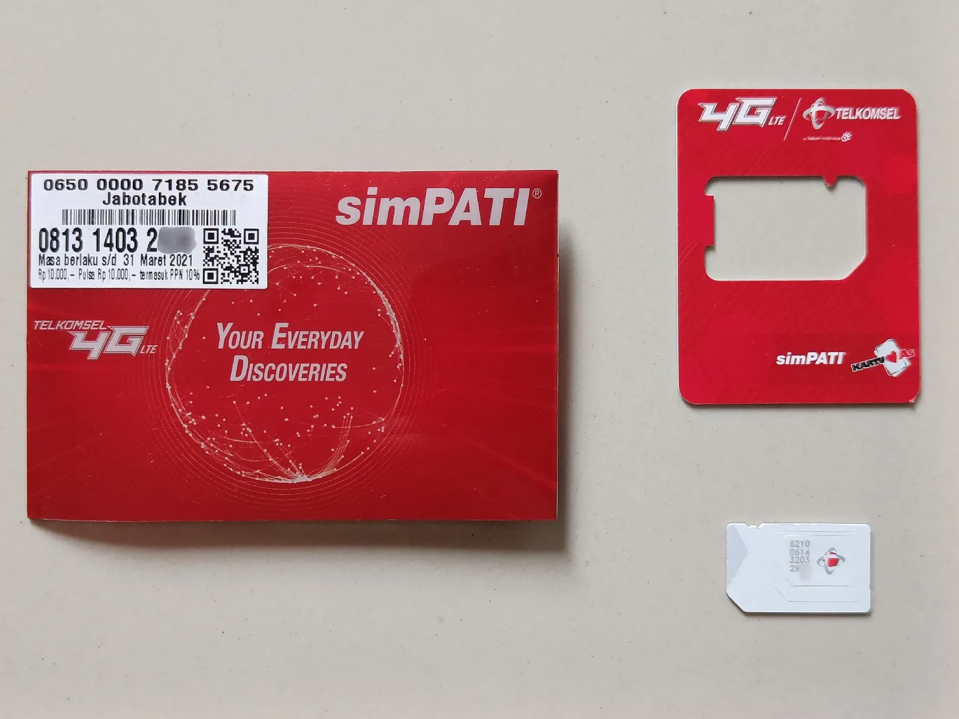 A Telkomsel prepaid SIM card and its pack